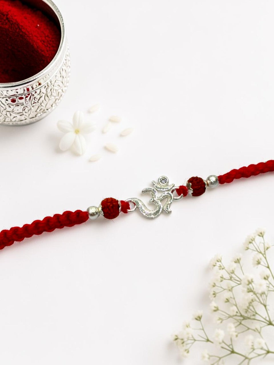 OM BHAVYA SILVER RAKHI