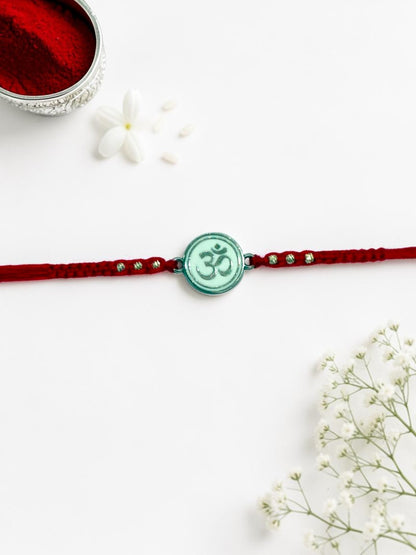 WHITE OM BHOOMI SILVER RAKHI