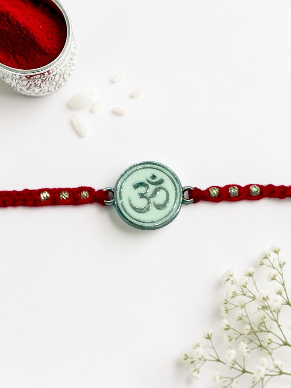 WHITE OM BHOOMI SILVER RAKHI