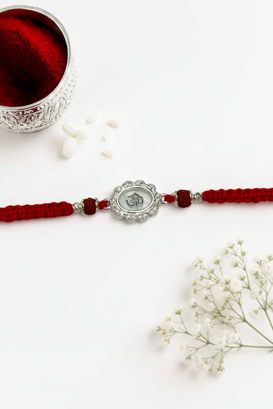 WHITE OM BHUMIKA SILVER RAKHI