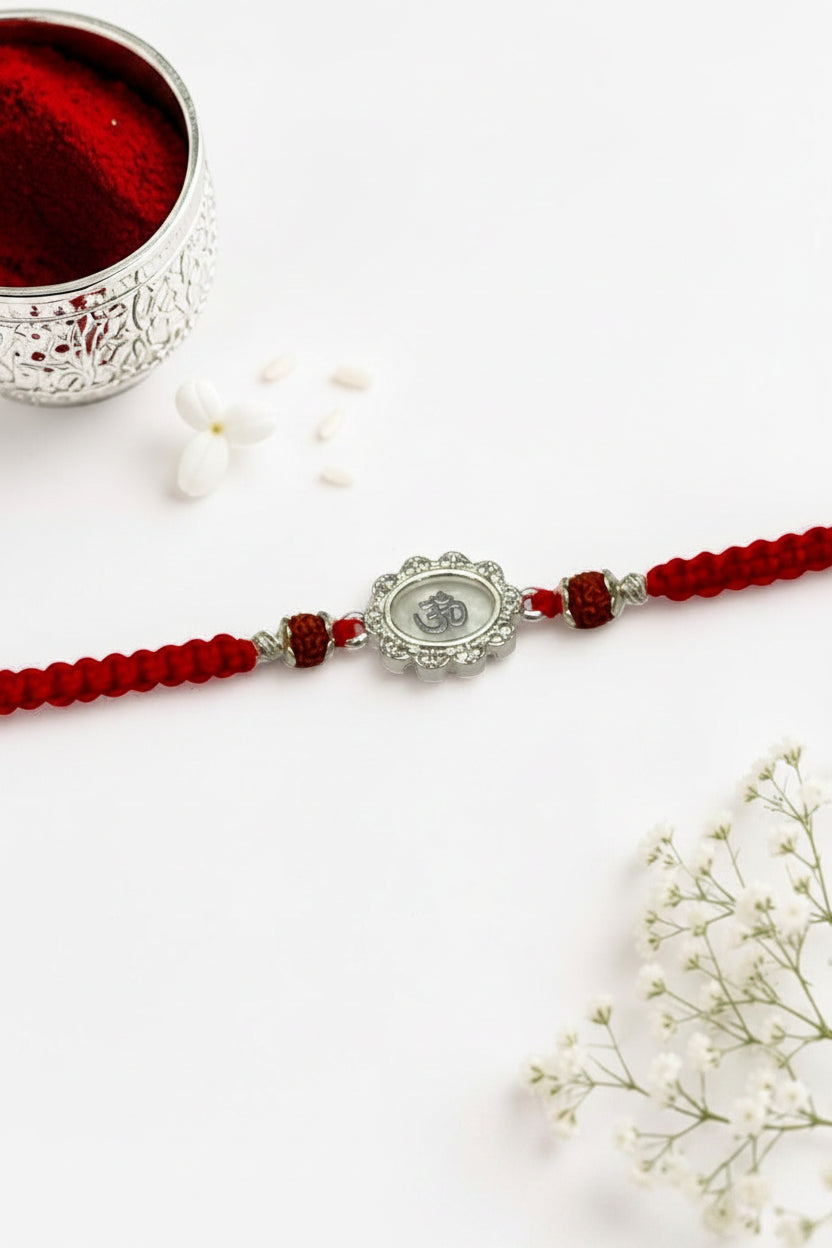WHITE OM BHUMIKA SILVER RAKHI