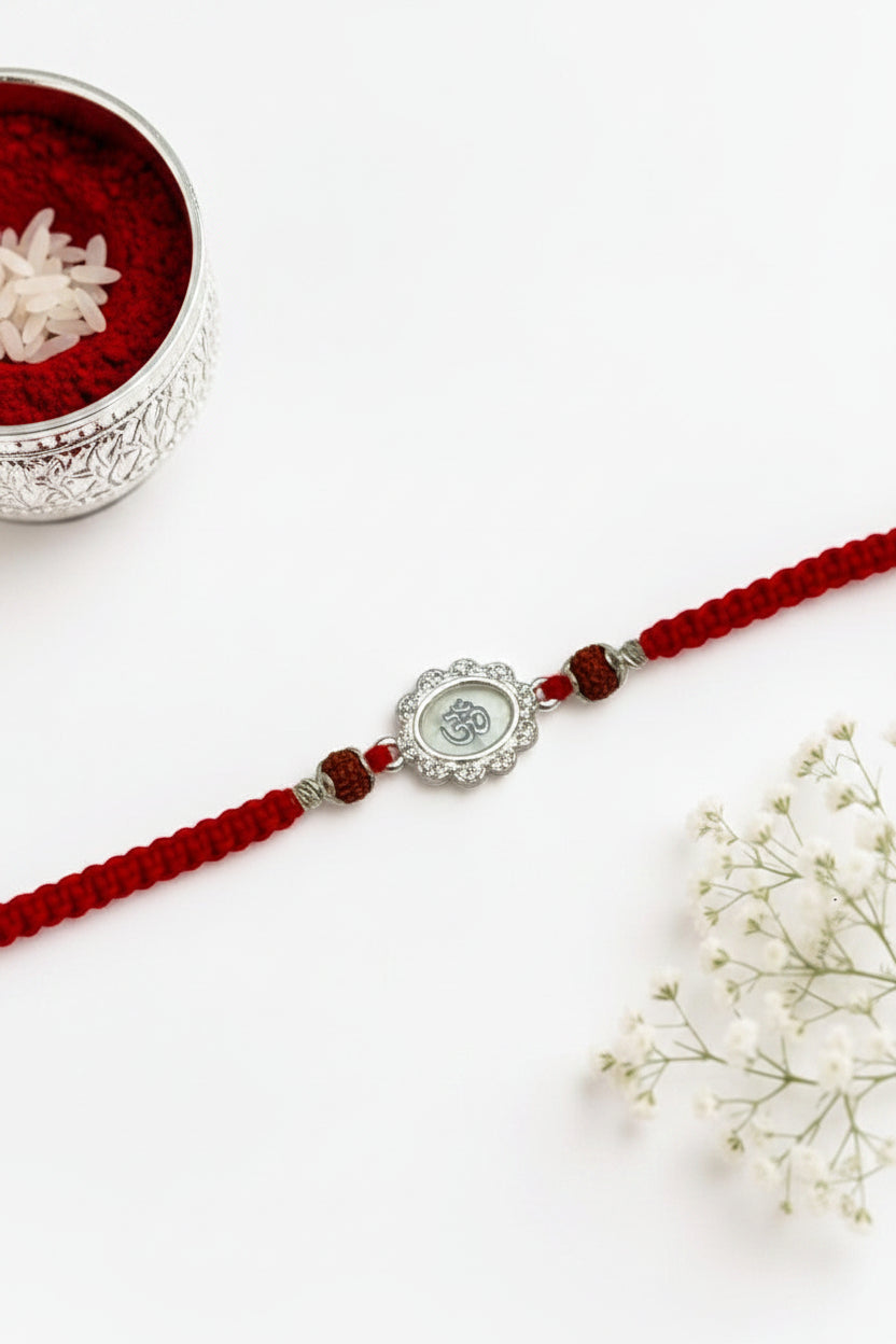 WHITE OM BHUMIKA SILVER RAKHI
