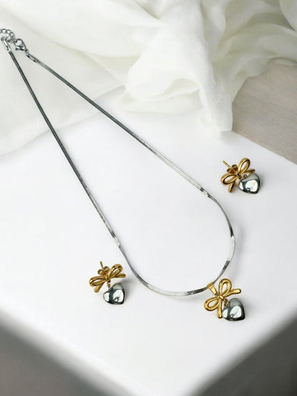 DUAL METAL GOLD AND SILVER A UNIQUE VERSATILE NECKLACE WITH BOW AND HEART