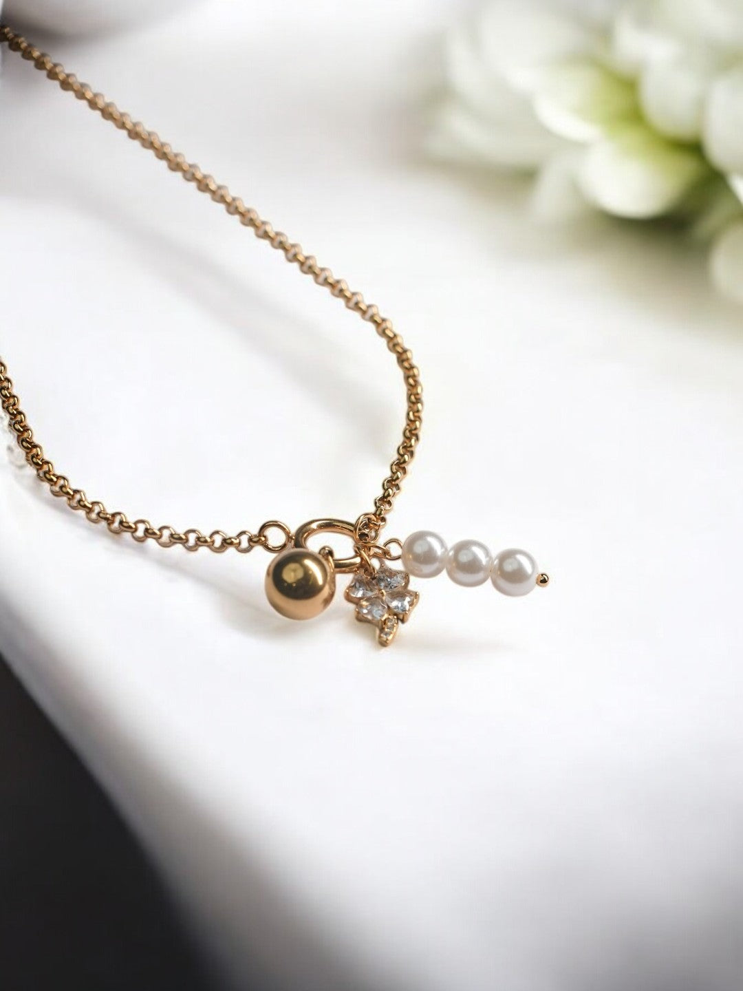 GOLDEN CHAIN WITH CHARMS LIKE DIAMOND FLOWER, PEARLS