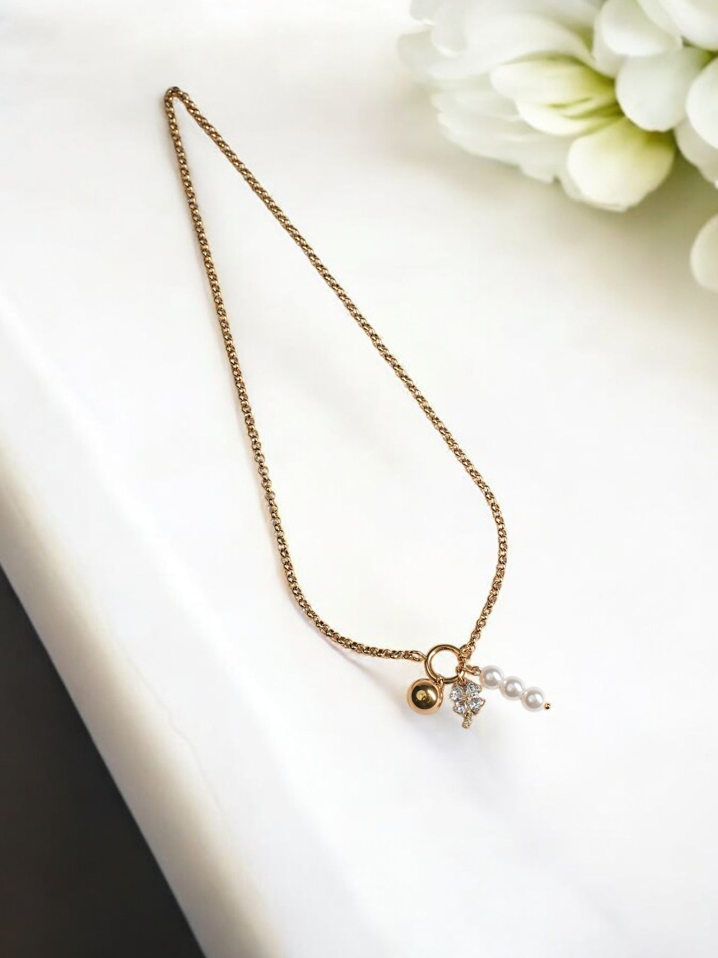 GOLDEN CHAIN WITH CHARMS LIKE DIAMOND FLOWER, PEARLS