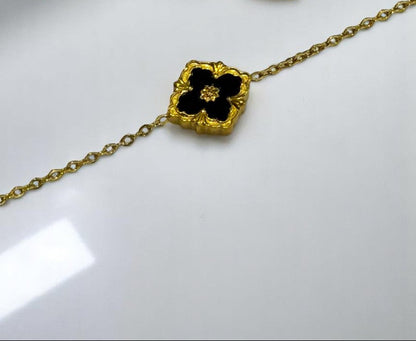 GOLDEN CHAIN WITH BLACK AND WHITE REVERSABLE BRACELET AND STUD EARRINGS