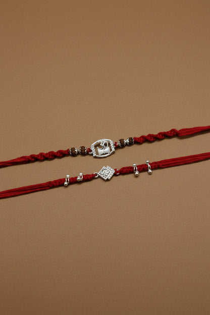 OM DAMRU DIAMOND AMORA COUPLE SILVER RAKHI