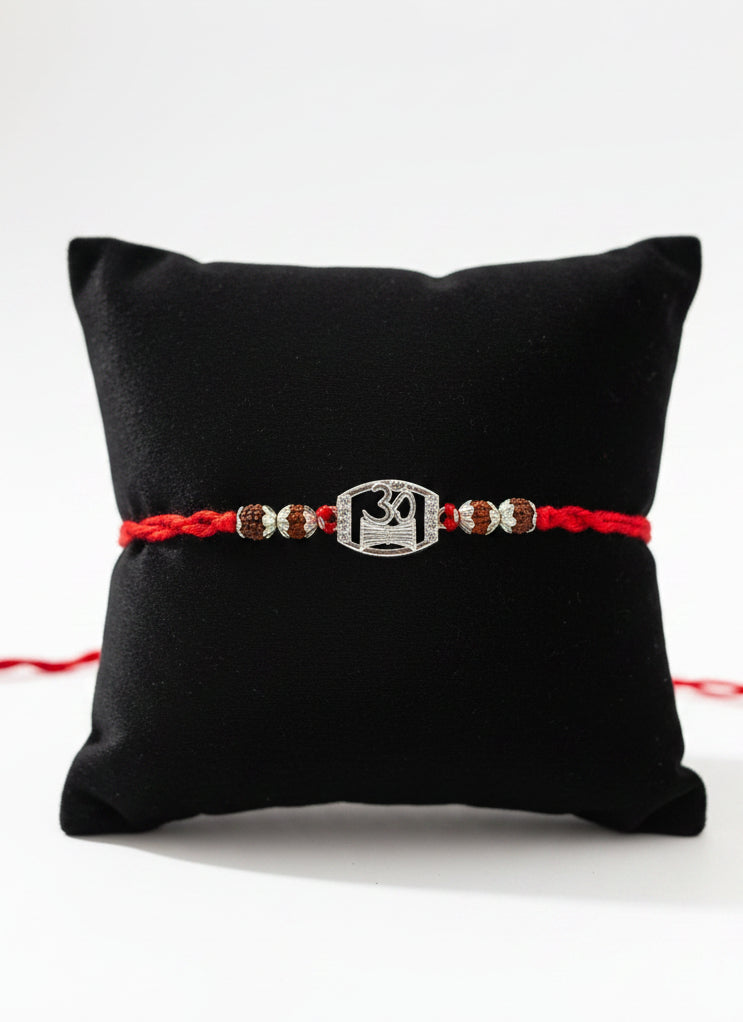OM DAMRU DIAMOND AMORA SILVER RAKHI