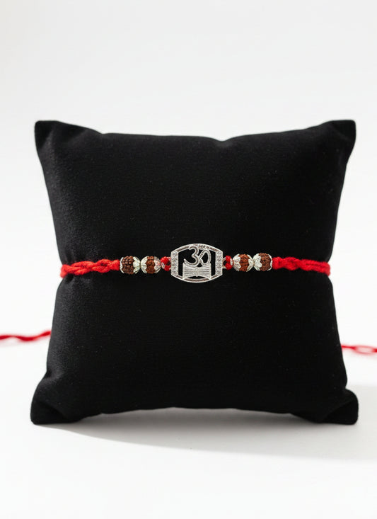 OM DAMRU DIAMOND AMORA SILVER RAKHI