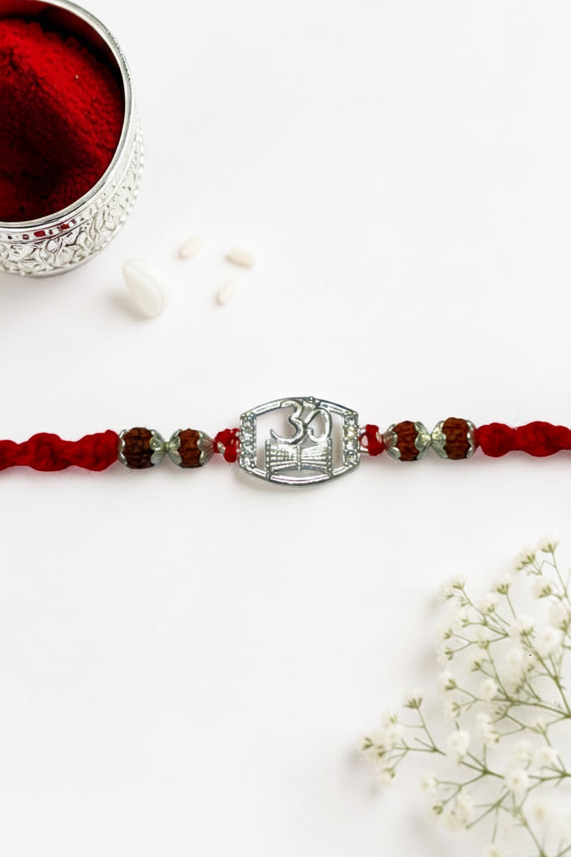 OM DAMRU DIAMOND AMORA SILVER RAKHI